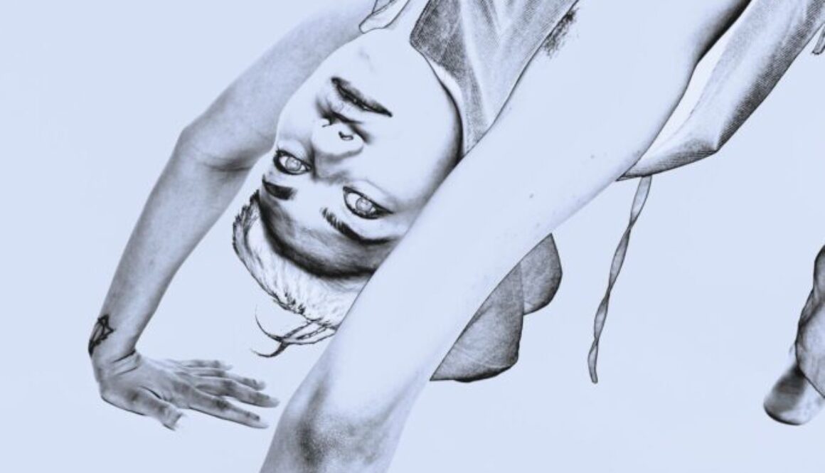 Eine Person kopfüber mit den Händen auf dem Boden